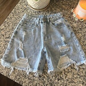 Brand New light denim distressed shorts